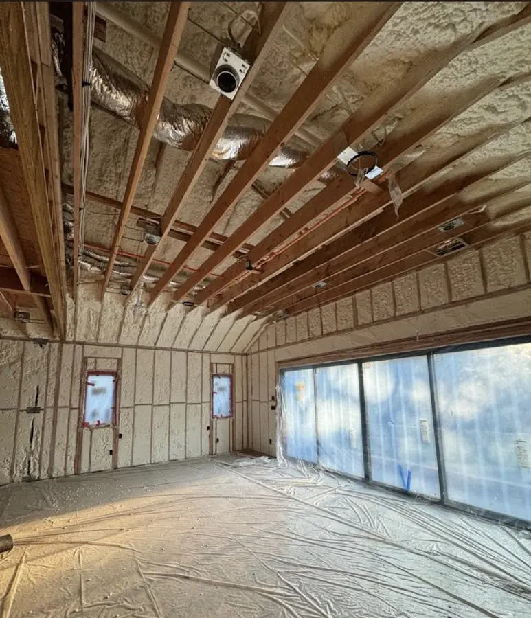 Interior walls and ceiling insulated with spray foam during new construction in Alvarado